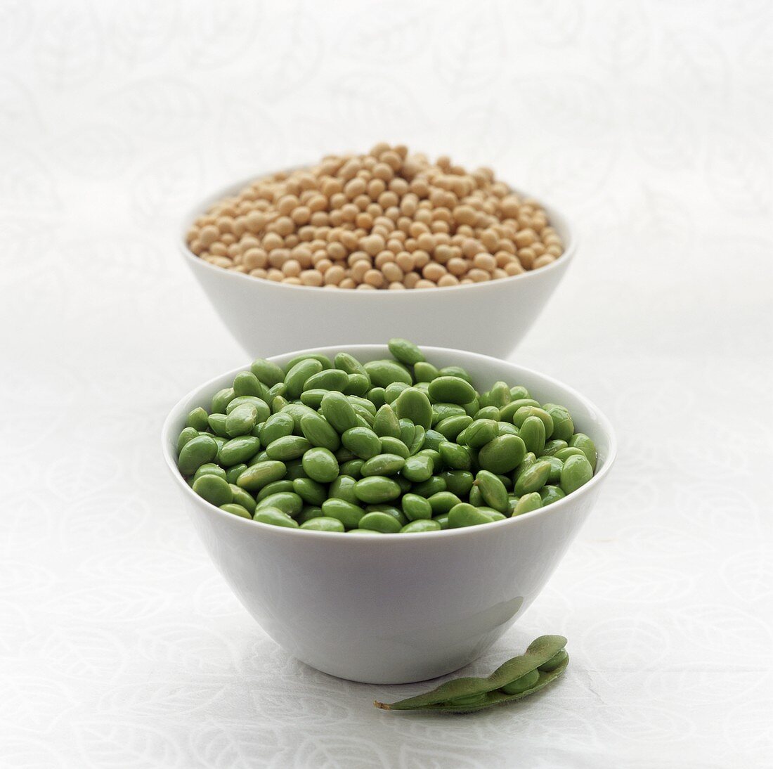 Soya beans, fresh and dried, in bowls