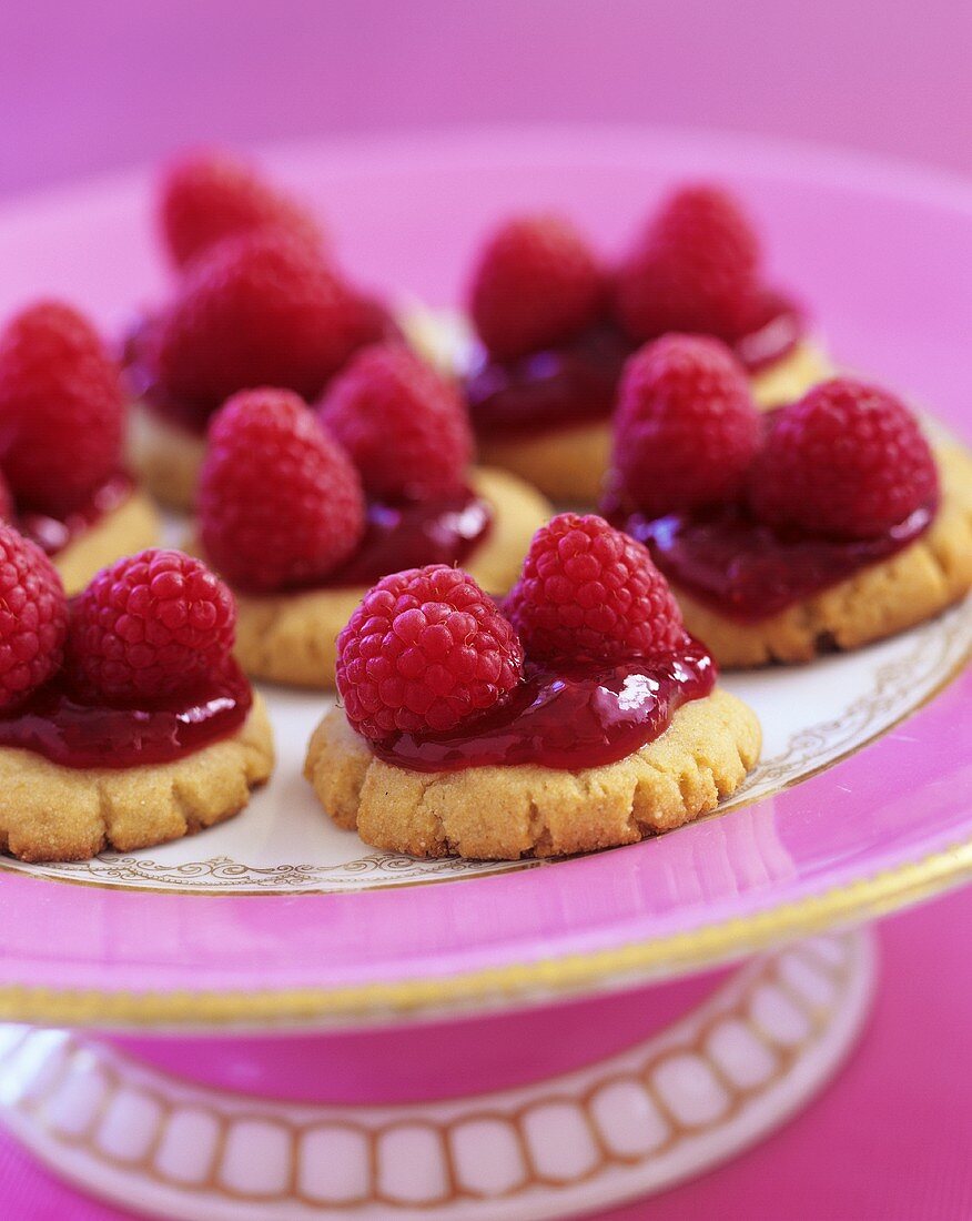 Butter Cookies with Raspberry Jelly Topping and Fresh Raspberries