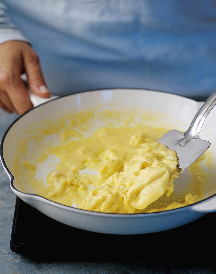 Preparing scrambled eggs