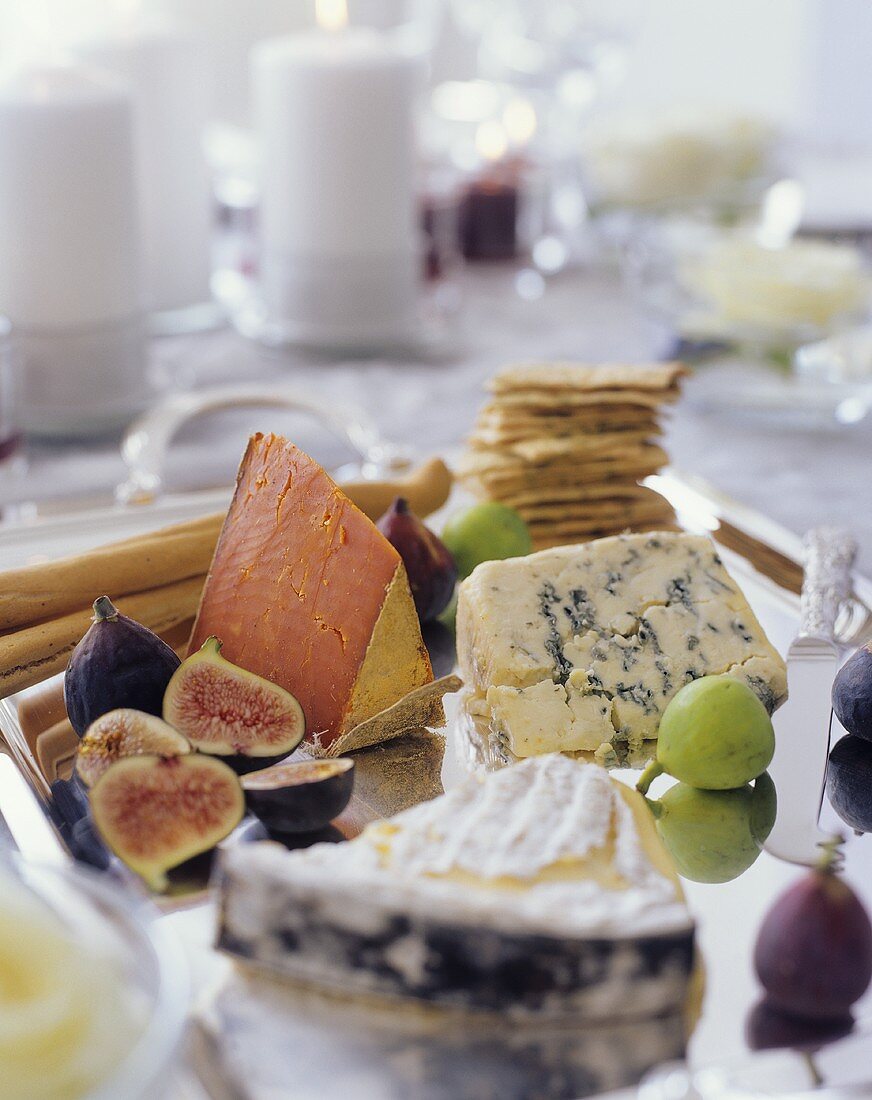 Assorted Cheeses on a Tray with Figs and Crackers