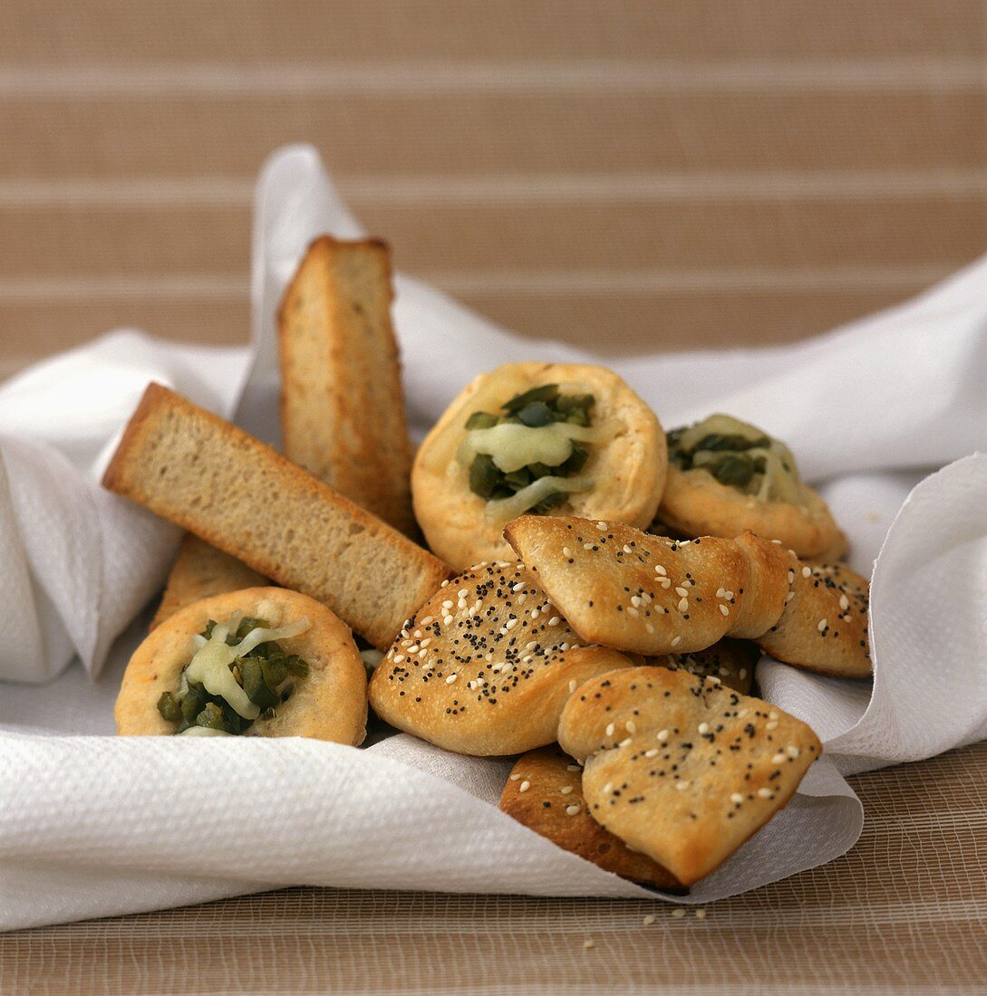Assorted Breads in a Napkin: Breadsticks, Poppy and Sesame Seed and Jalapeno and Cheddar