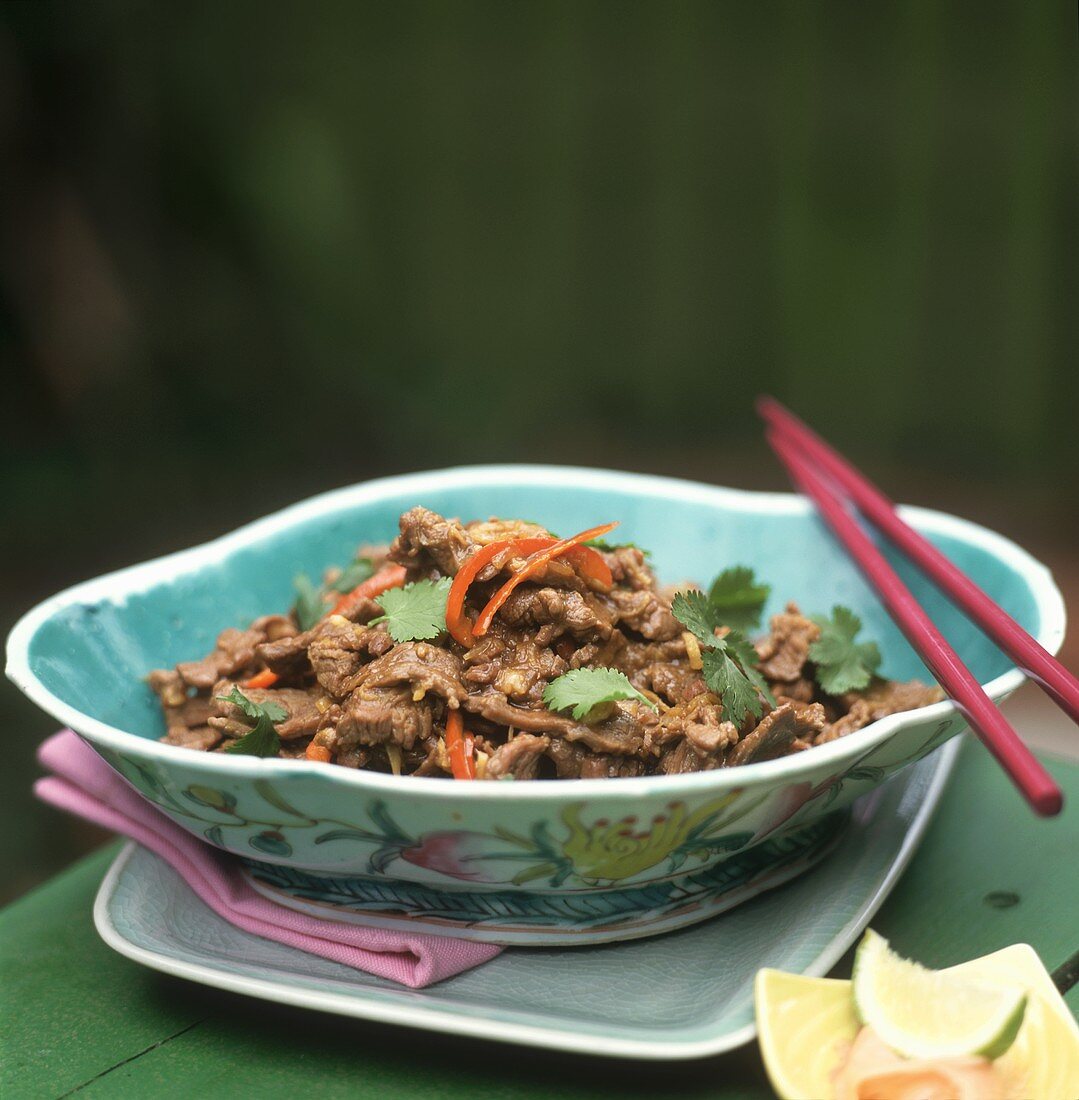 Beef with coriander leaves and carrots (Asia)