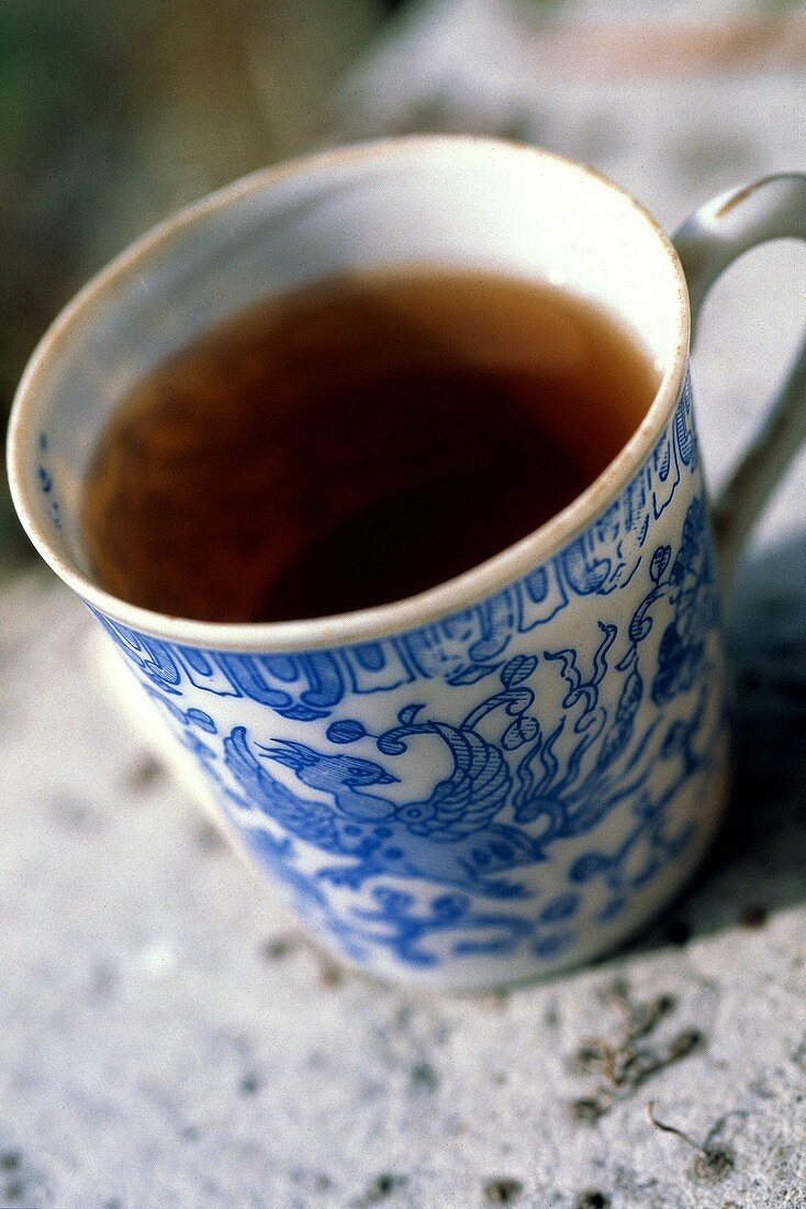 Tee in asiatischer Teetasse