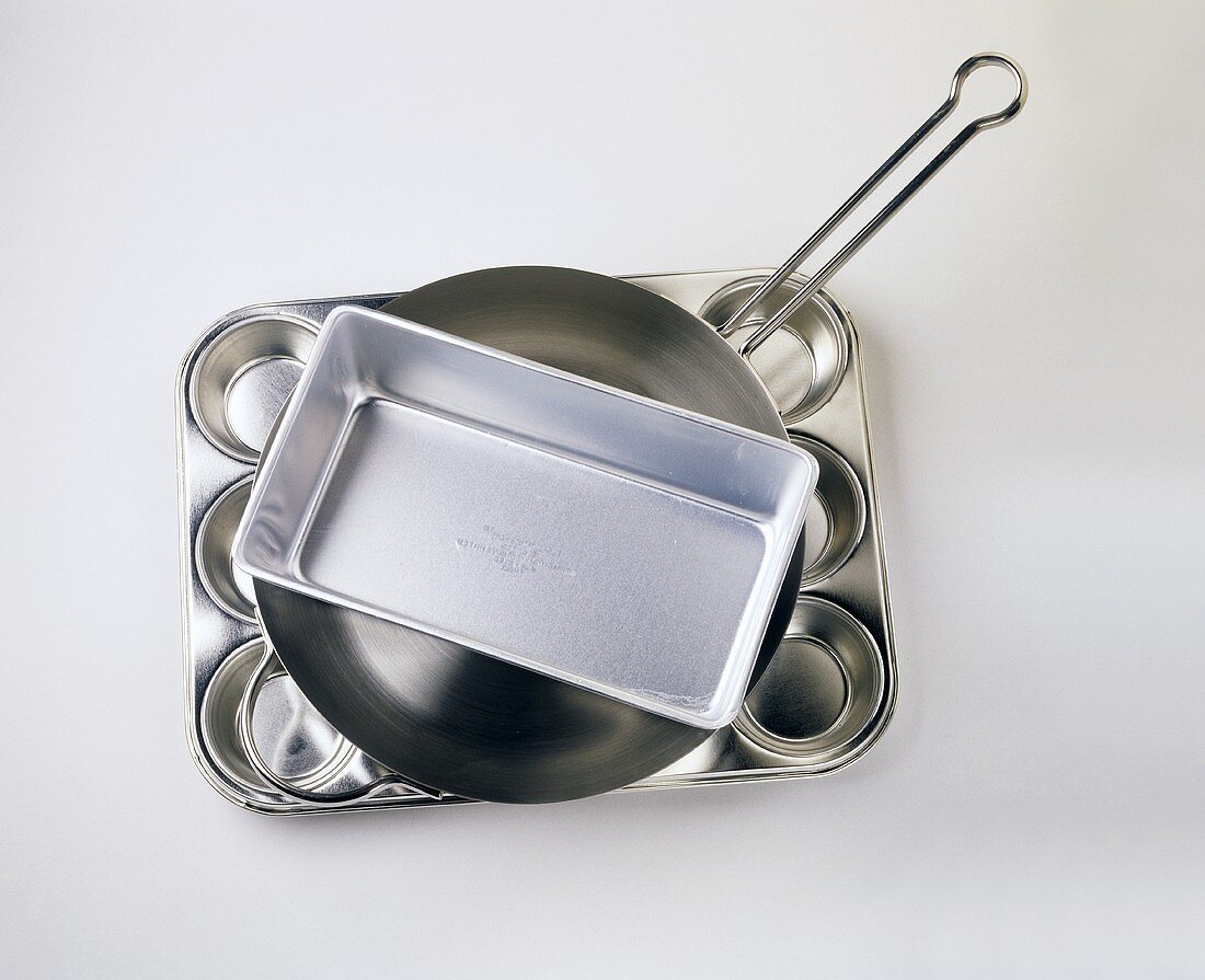 A Stack of Pans;Muffin Pan Skillet and Loaf Pan