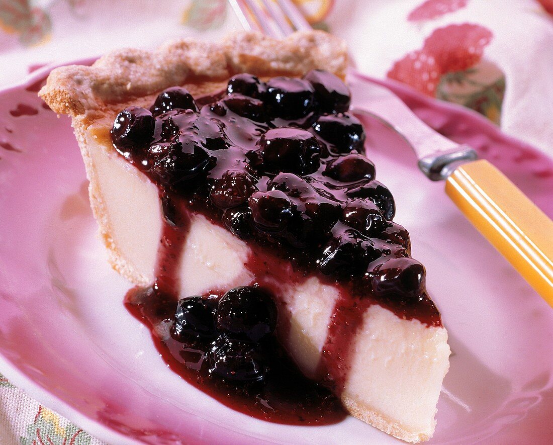 A Slice of Cheesecake with Blueberries
