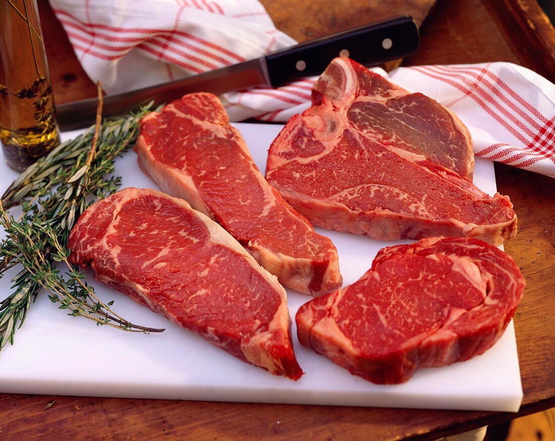 Assorted Steaks on a Cutting Board