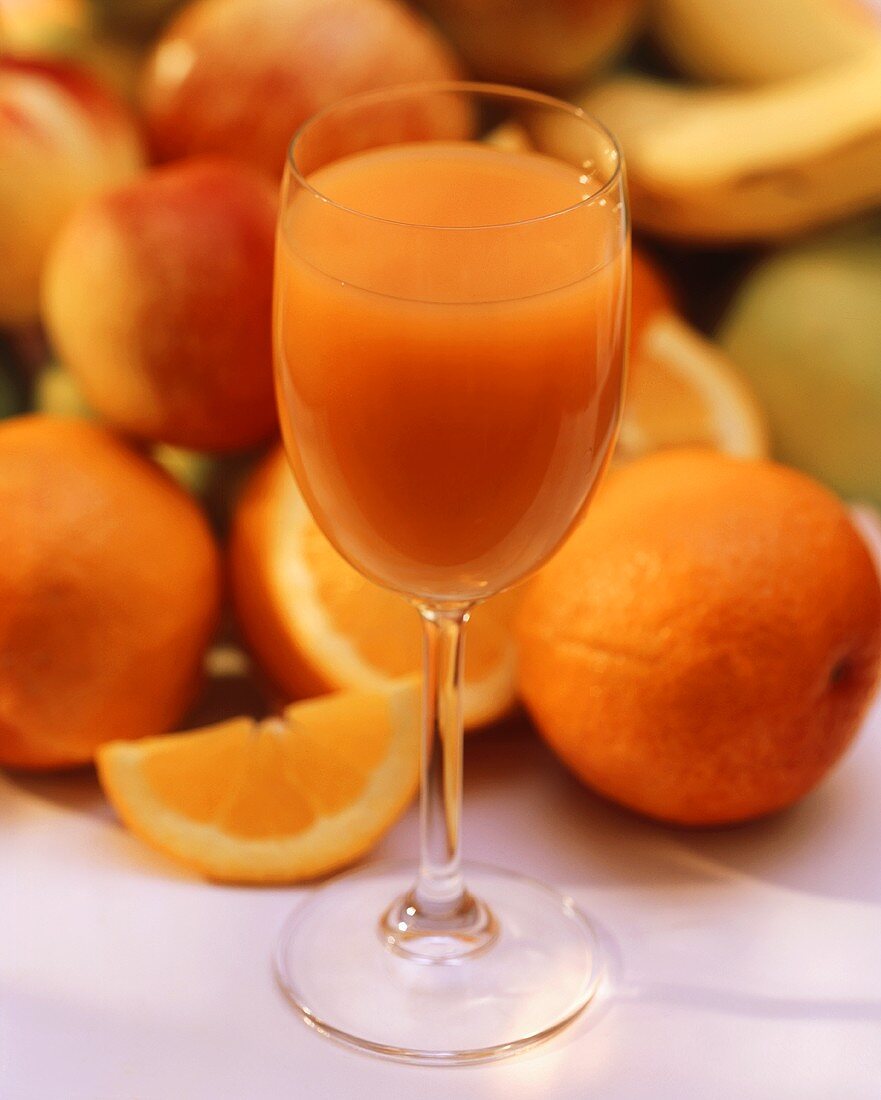 Fresh Multi Vitamin Juice in a Stem Glass; Assorted Fruit