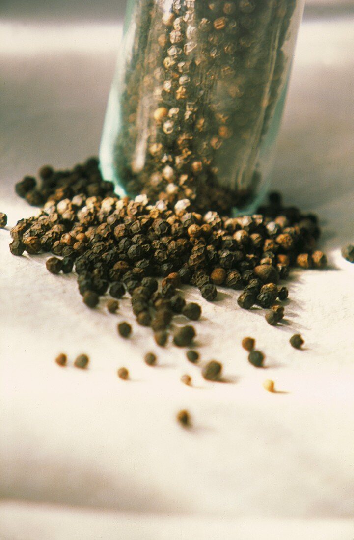 Peppercorns in and Around a Jar