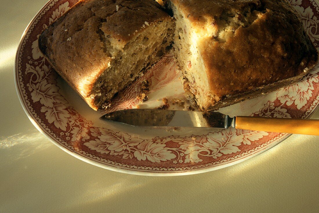 A Loaf of Cranberry Nut Bread Cut in Half