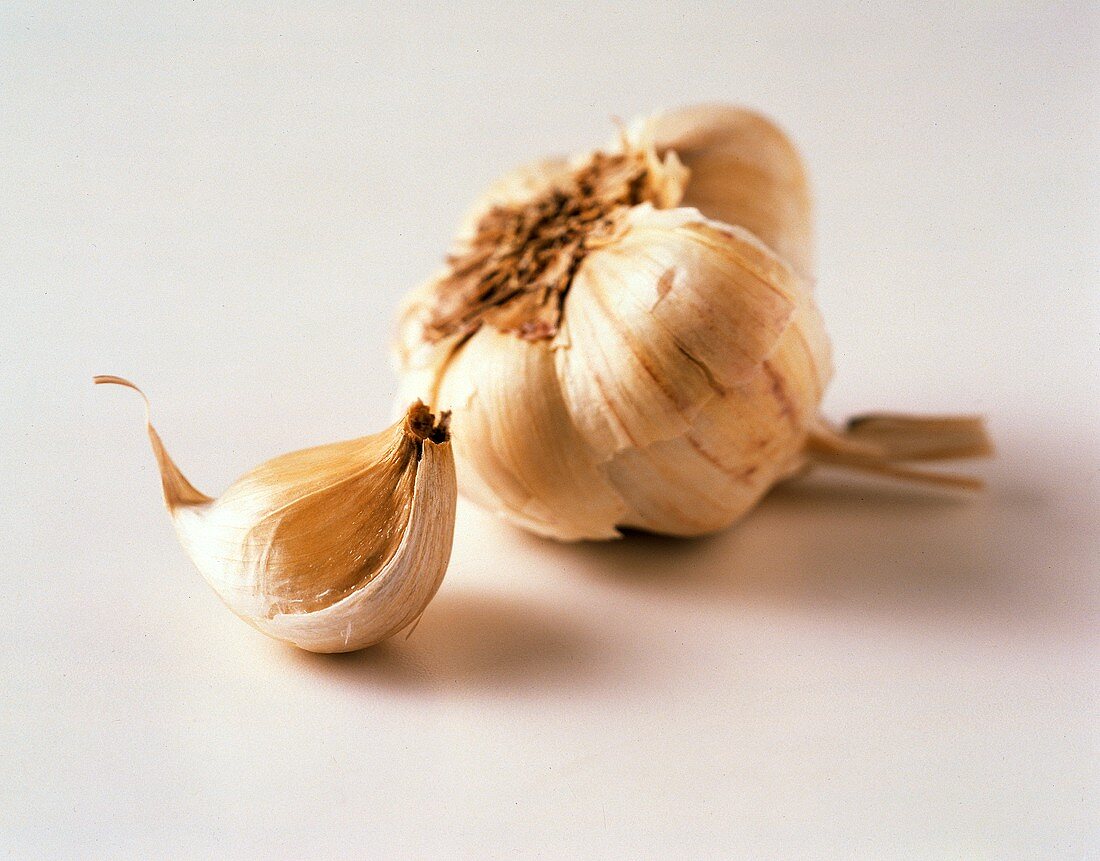 Garlic Bulb with a Clove of Garlic