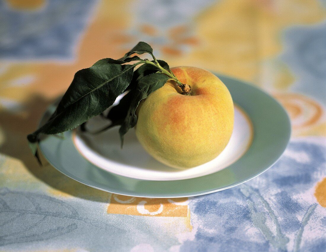 One Whole Peach with Leaves; Plate