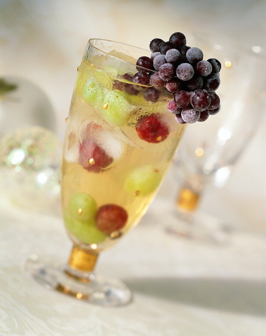 Refreshing Glass of Fruit Juice; A Bunch of Grapes