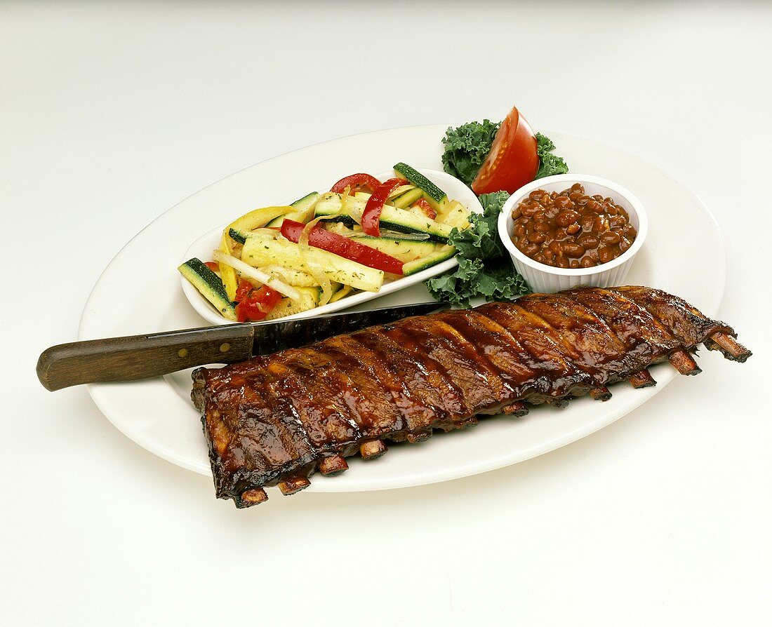 Rack of Ribs with Baked Beans and Vegetables