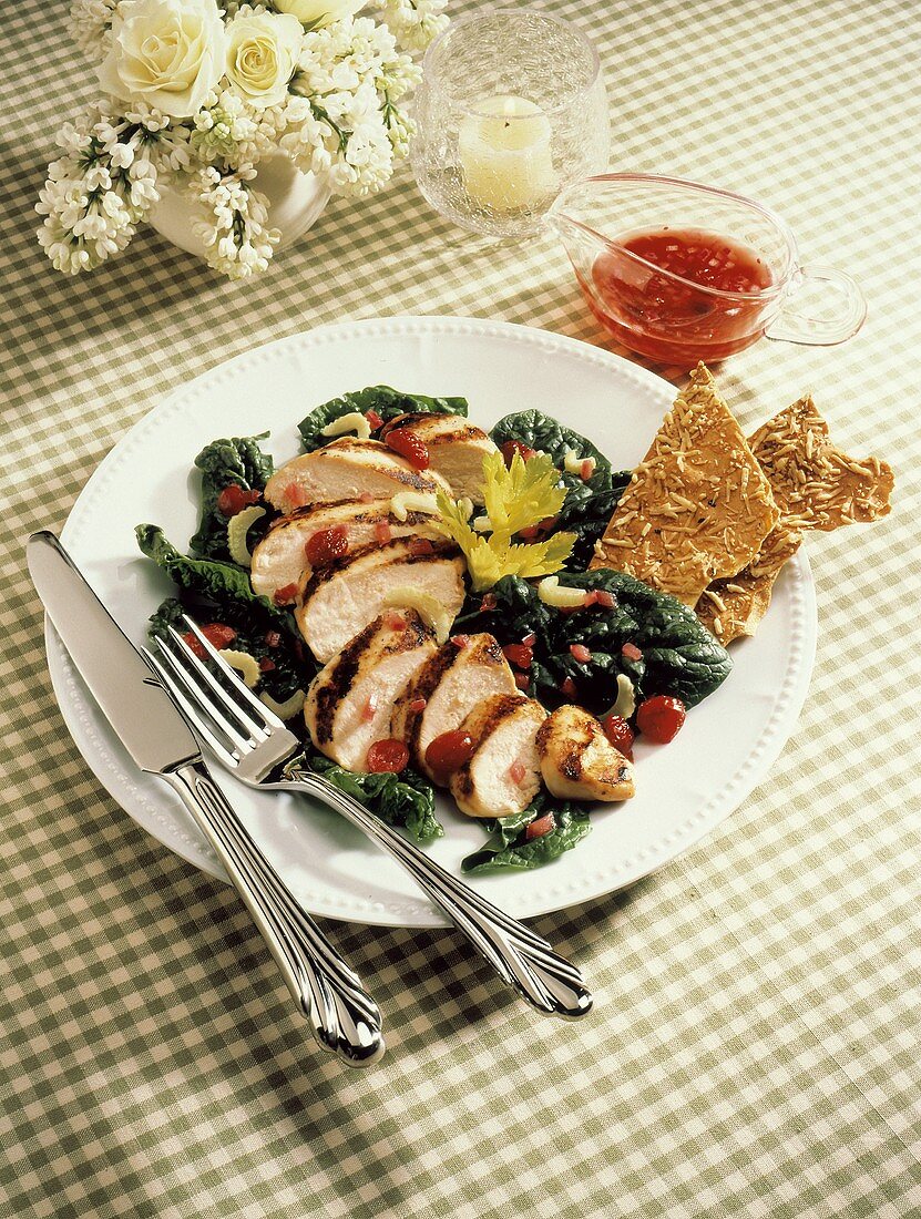 Grilled Pork Sliced over Spinach Salad