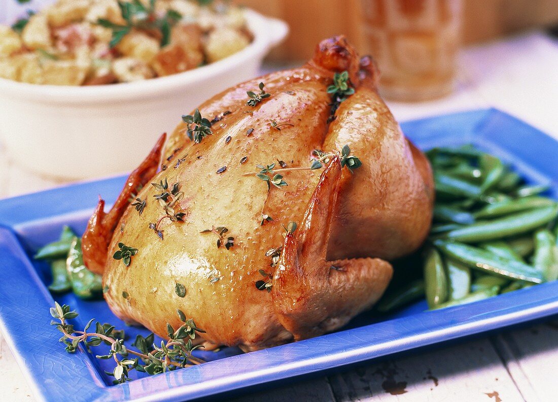 Brathähnchen mit Thymian und Zuckerschoten