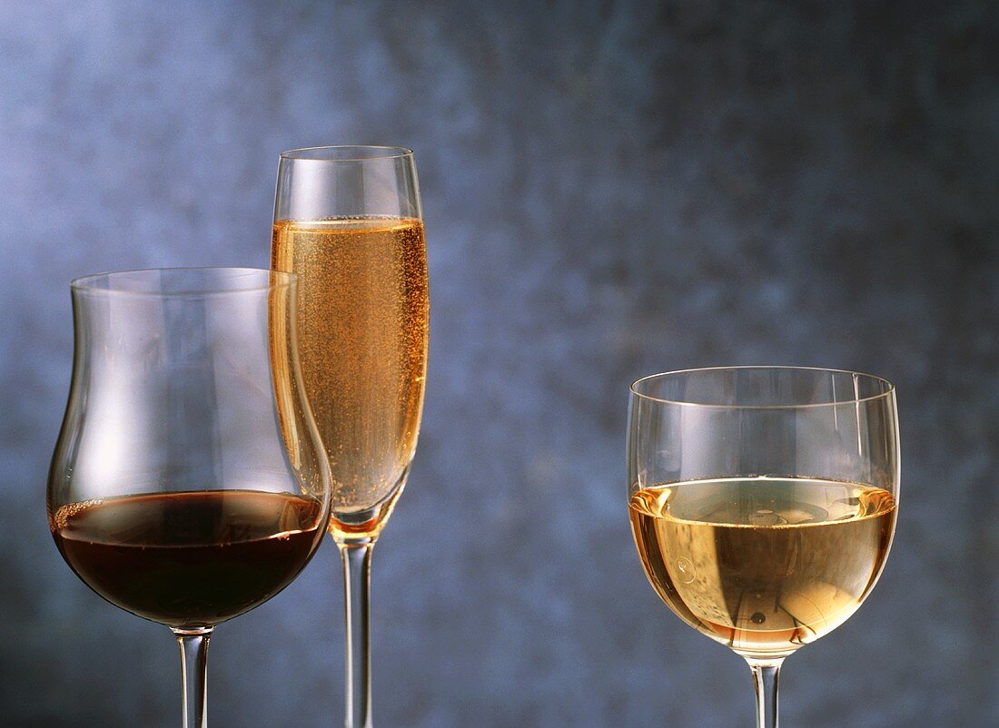 Red White and Sparkling Wines with Blue Background