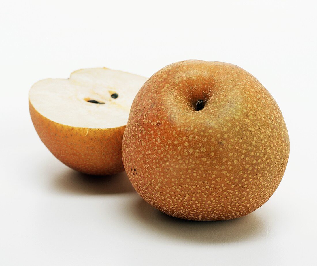 Nashi pear, whole and half