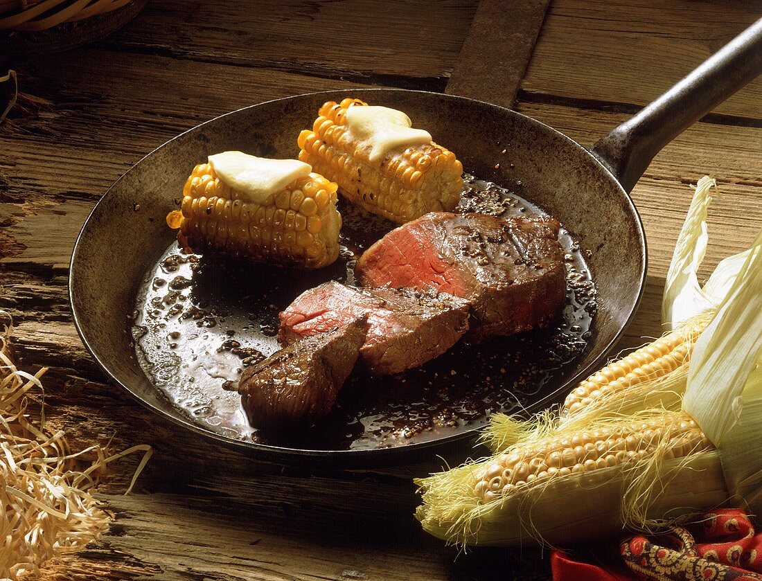 Juicy Steak with Corn-on-the-Cob in a Pan
