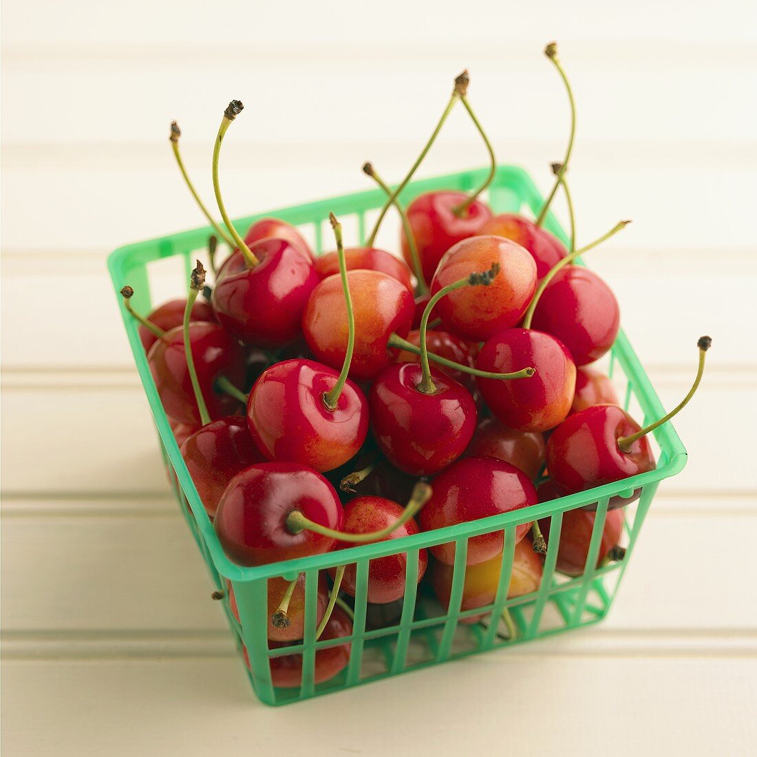 Cherries in a plastic basket