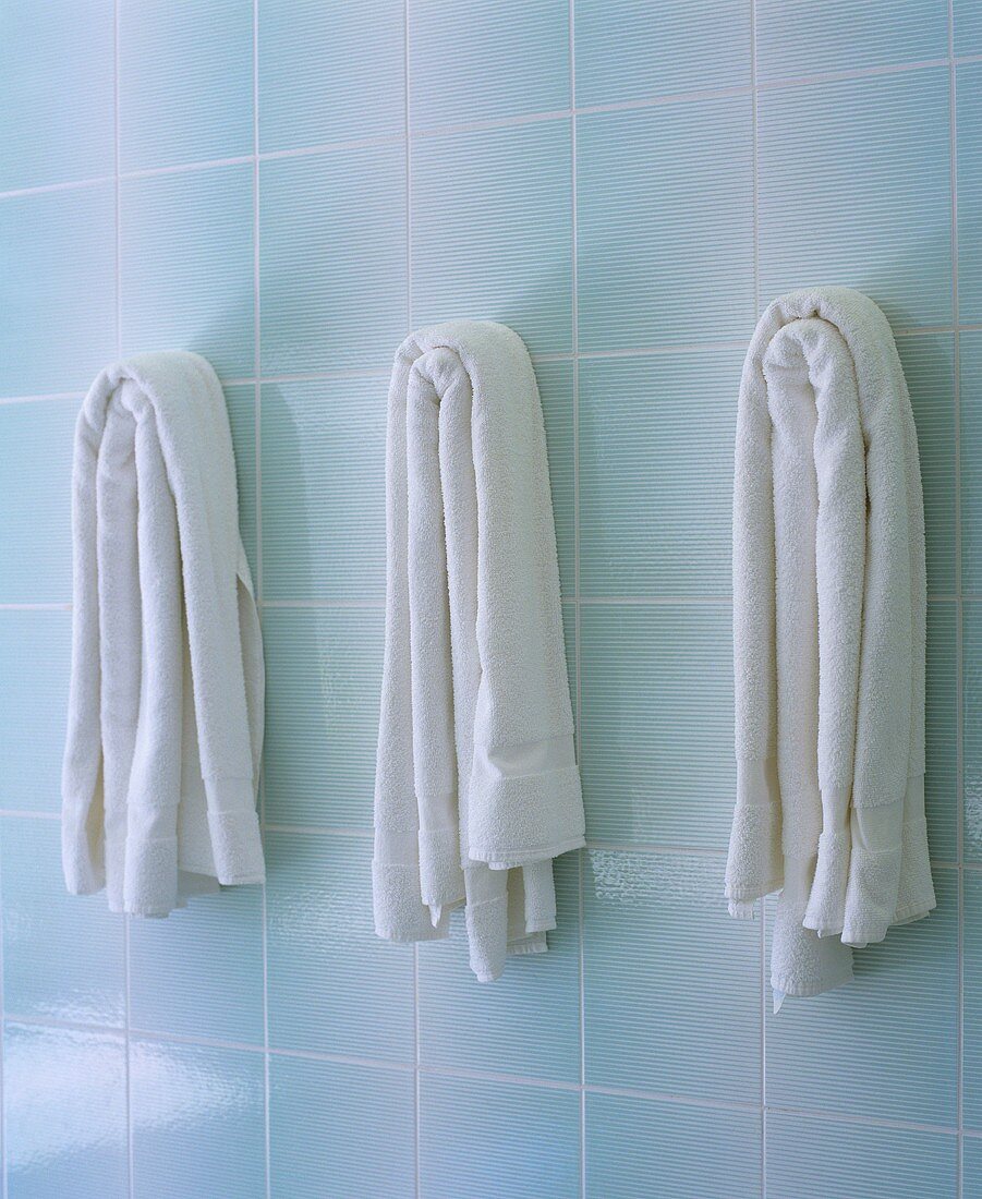 Three white bath towels