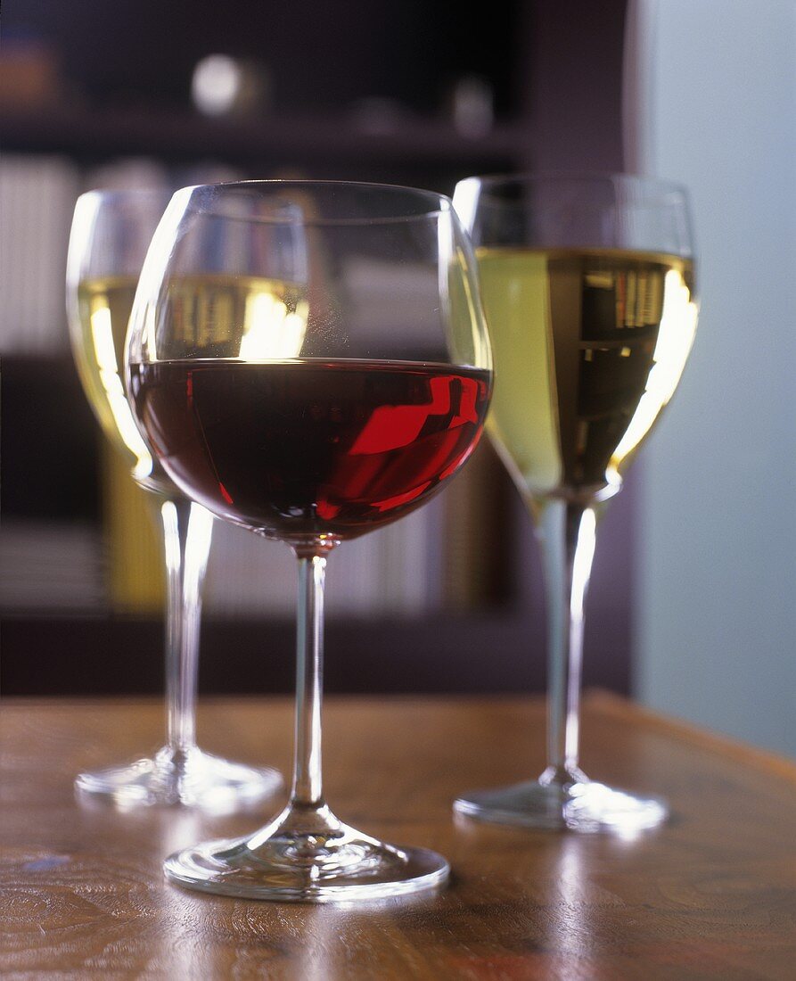 Three glasses of red and white wine