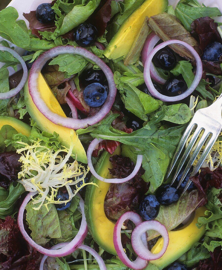 Mixed salad with avocado and blueberries