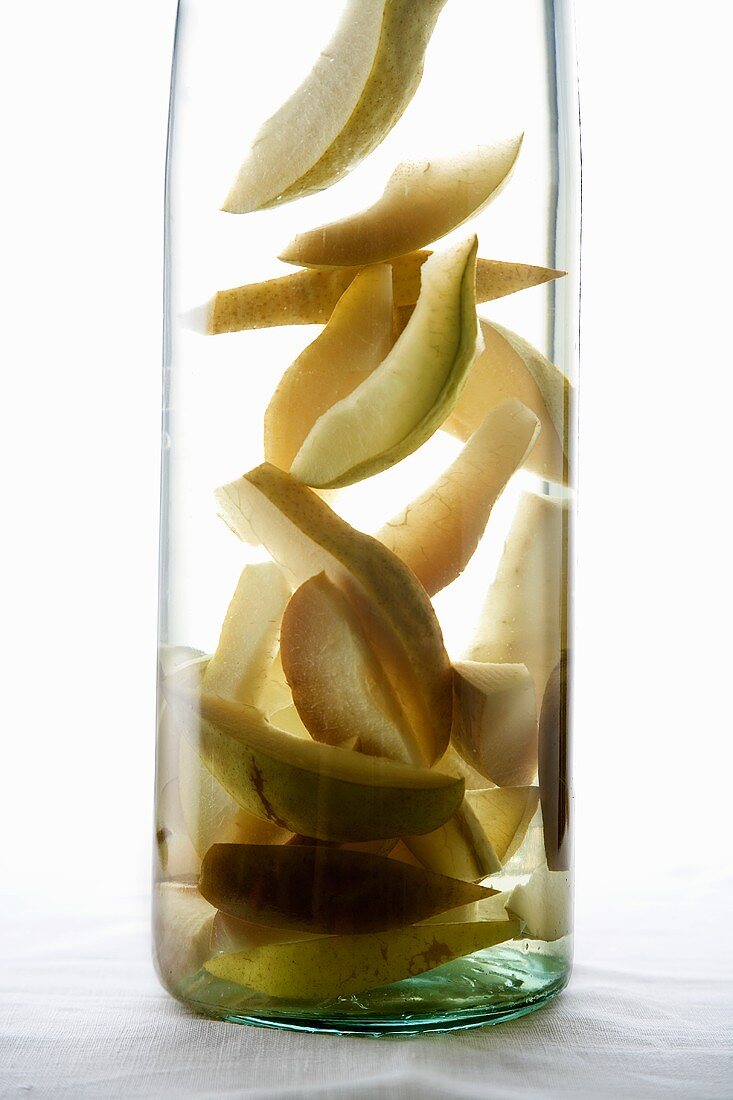 Pear Slices in a Tall Glass Bottle