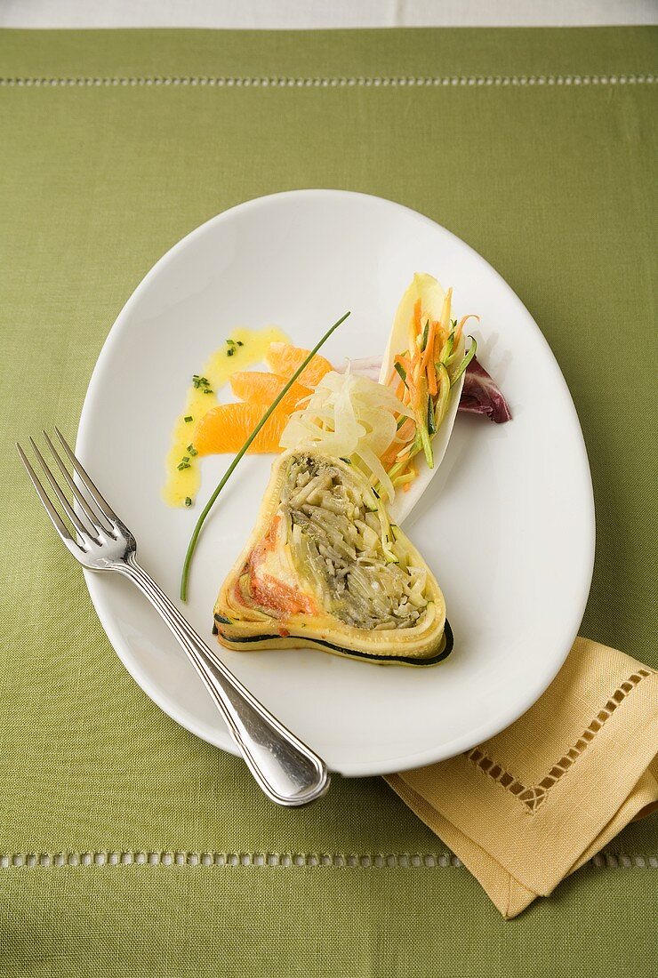 Serving of Vegetable Terrine on a White Plate with Fork