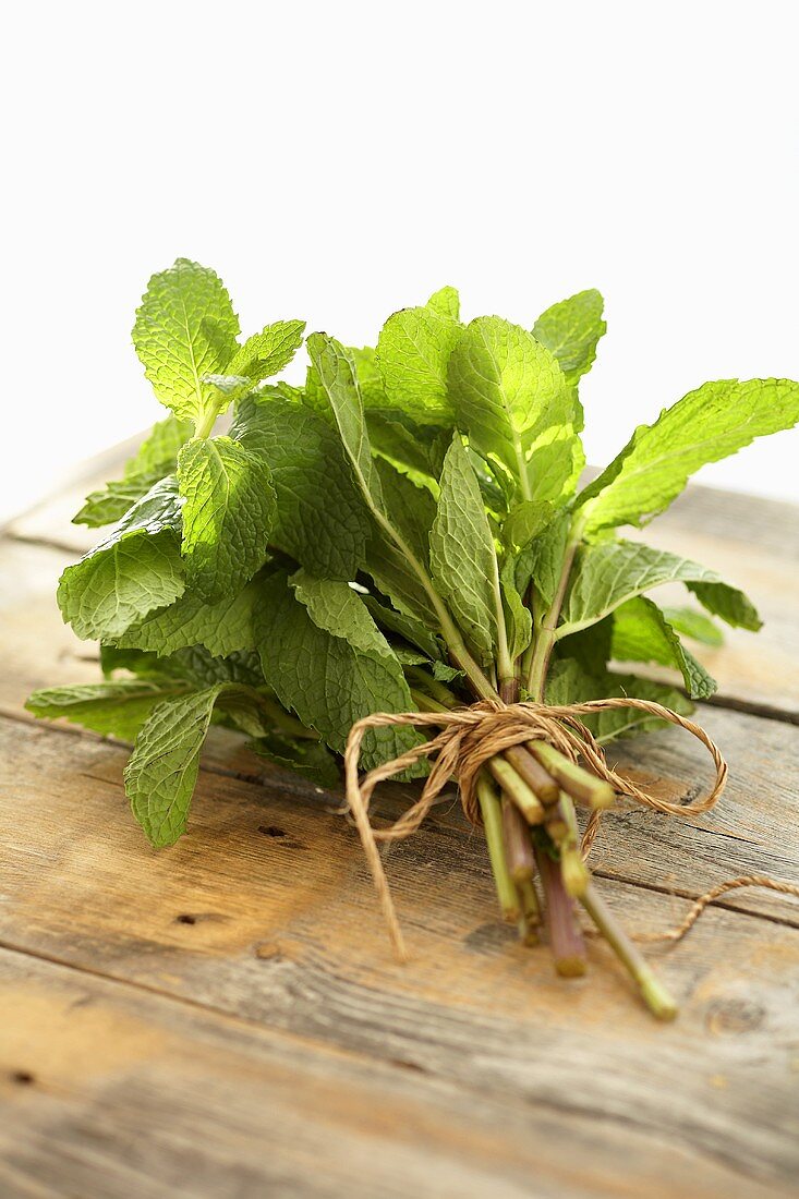 Fresh Bundle of Mint on Wood