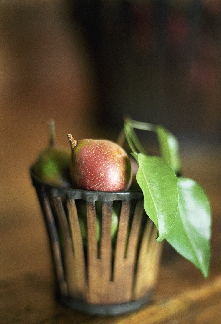 Small pears in a basket