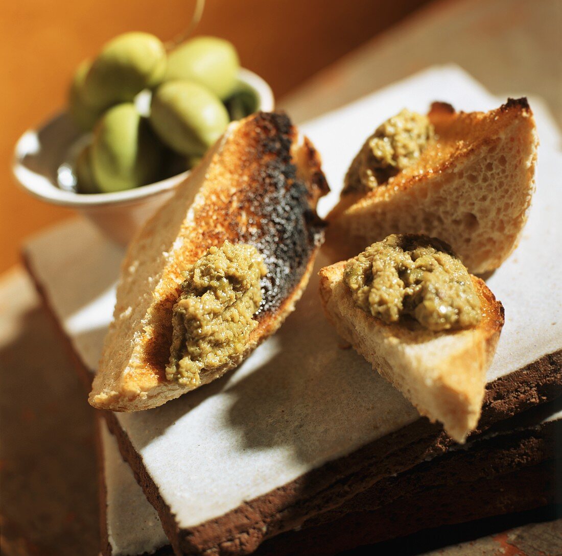 Green Olive Tapenade on Bread Pieces