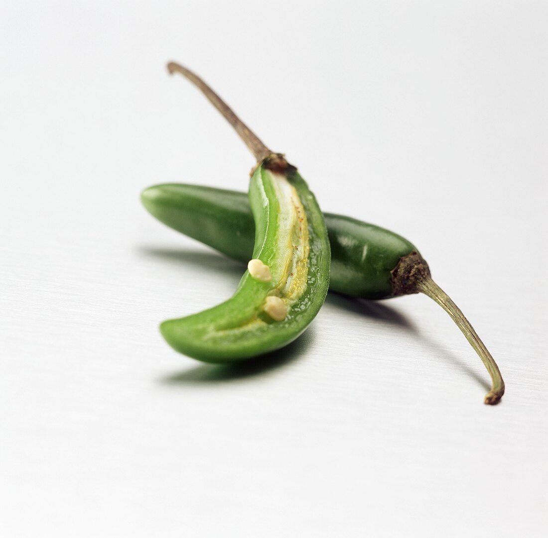 Green Serrano Pepper with a Half of One