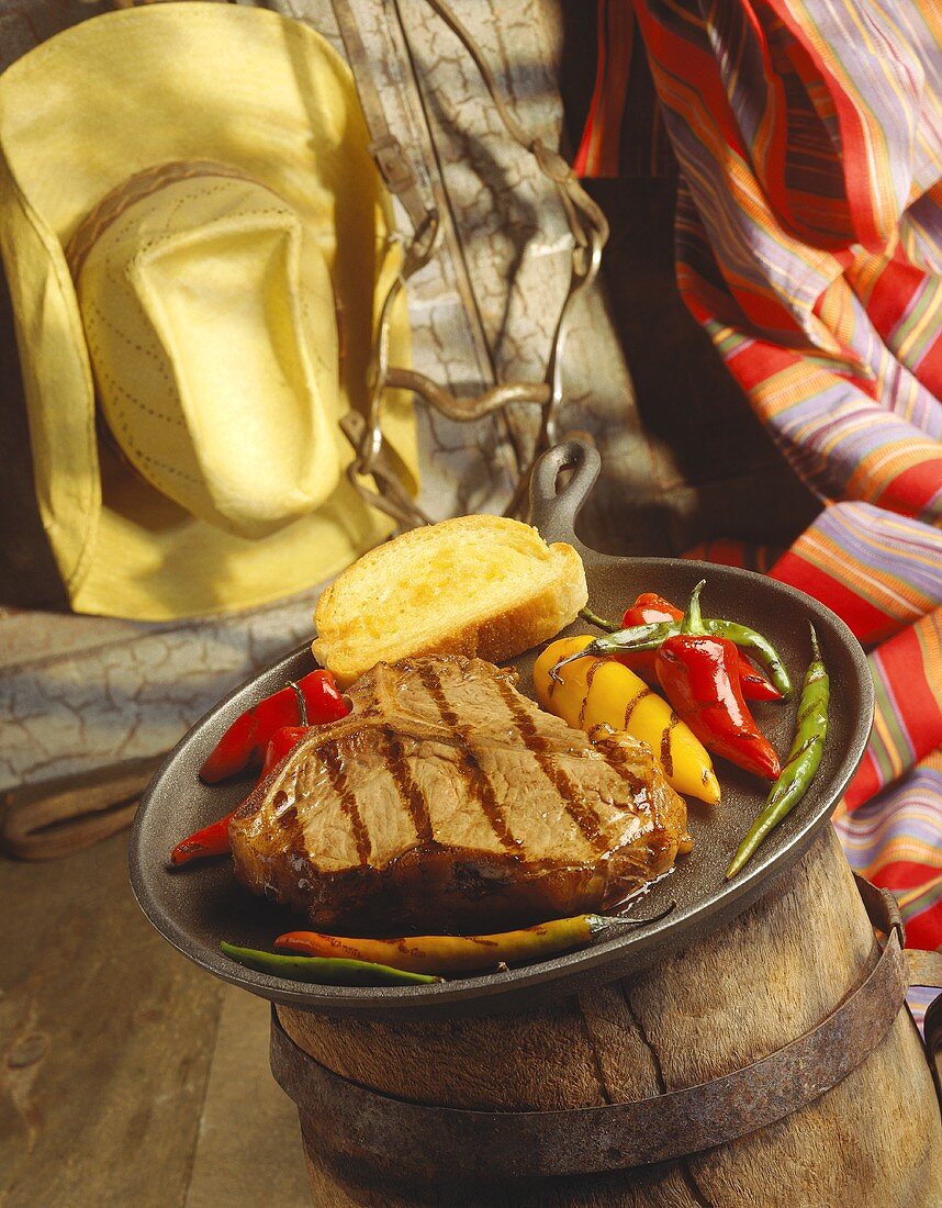T-Bone Steak with Grilled Peppers and Texas Toast; Western Setting