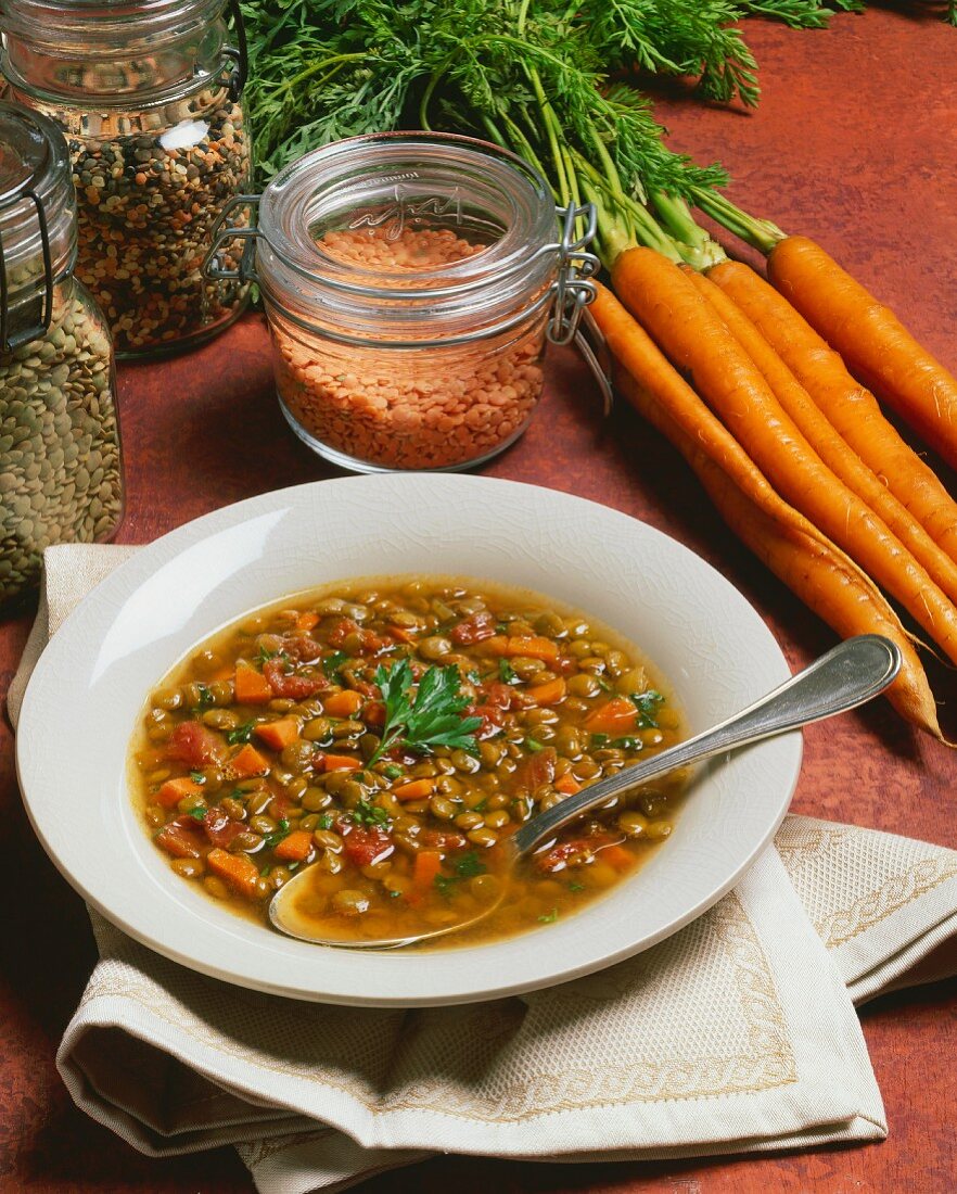 Bowl of Lentil Carrot Soup with Ingredients