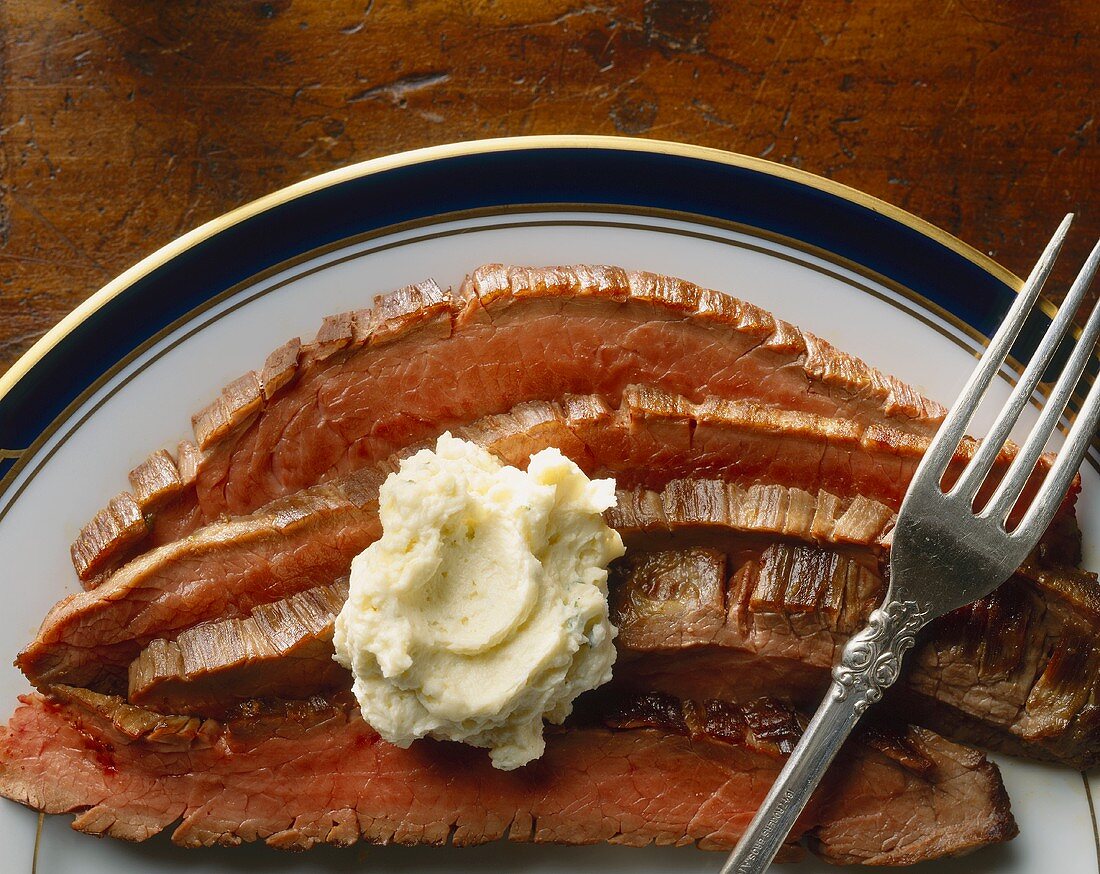 Sliced Flank Steak with Herb Butter