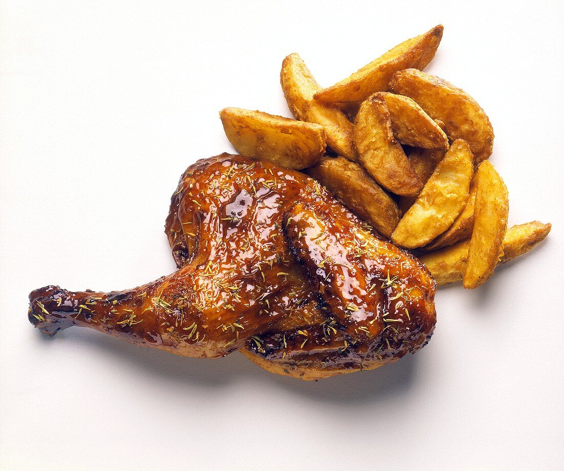 Barbecued Piece of Chicken with Fried Potatoes