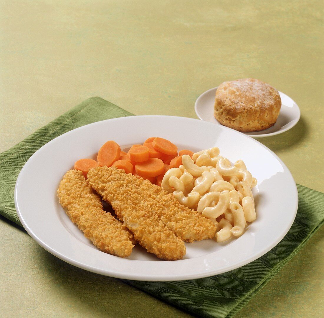 Breaded chicken tenders with macaroni and carrots; scone