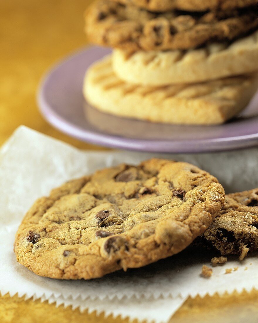 Chocolate Chip Cookie with Cookies in the Background