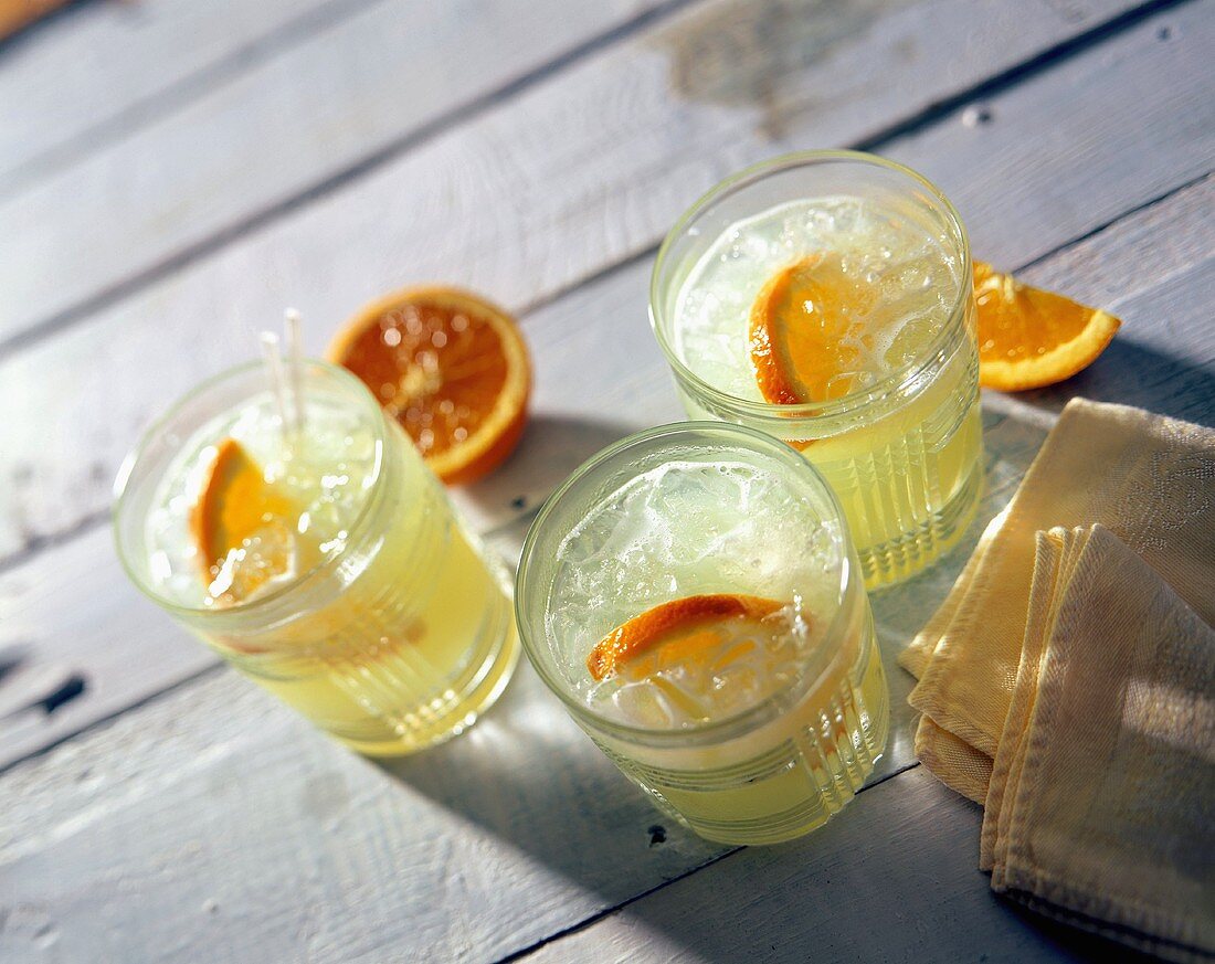 Several Glasses of Orangeade Drinks