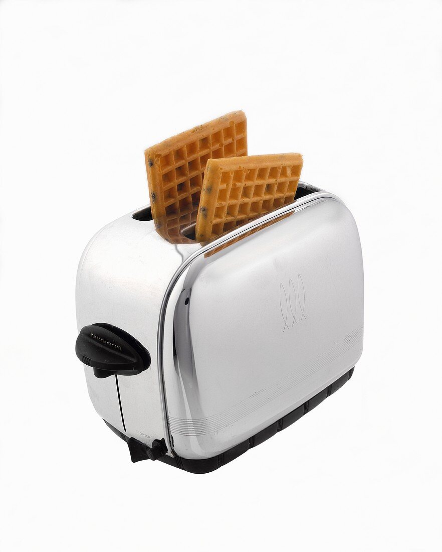 Two Blueberry Waffles in a Toaster