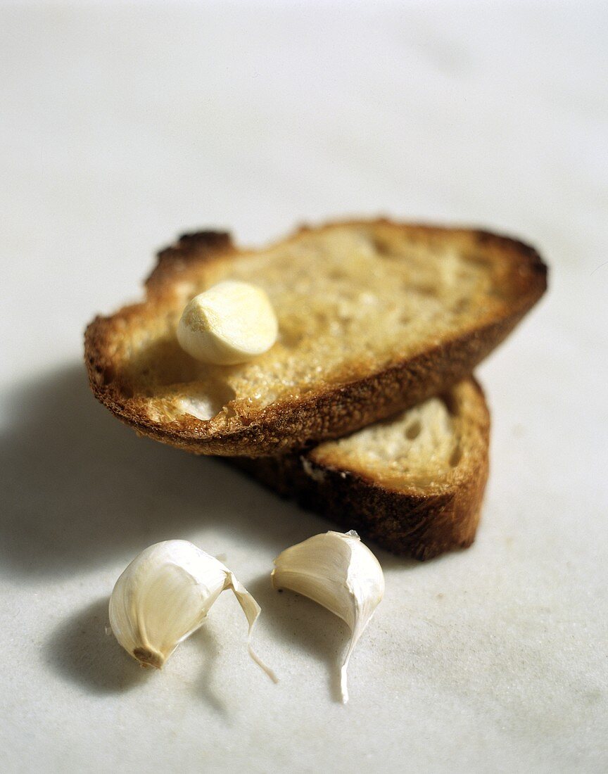 Slices of toasted bread with garlic
