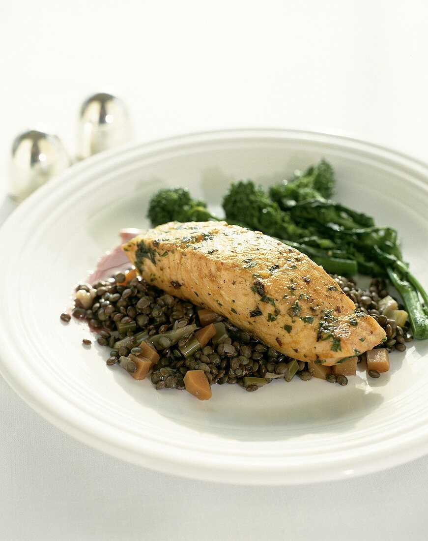 Salmon fillet on lentils with broccoli