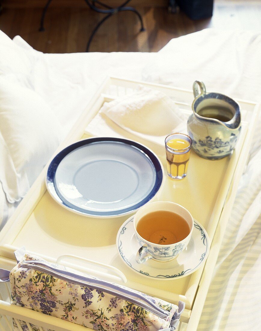 Breakfast tray with tea in bed