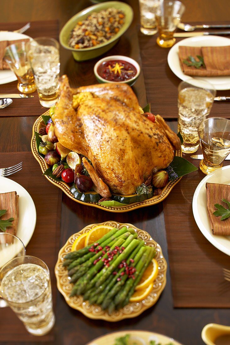 Roast Turkey and Side Dishes on Thanksgiving Table