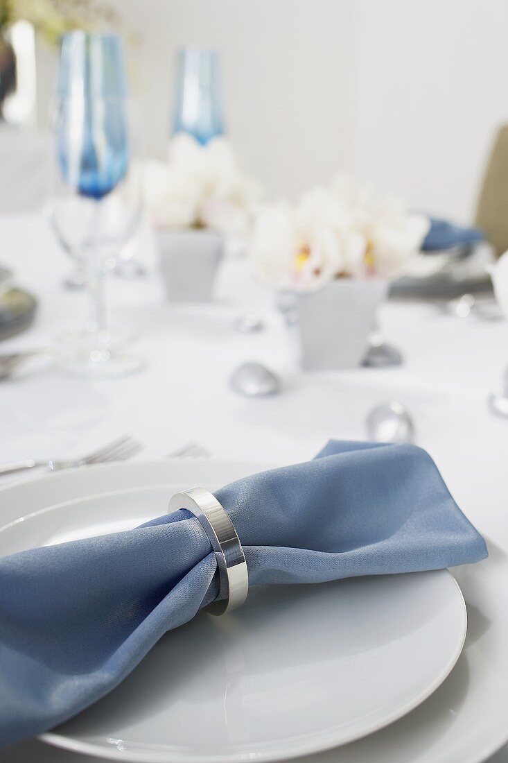 Blue Cloth Napkin on Place Setting on Table Set for Hanukkah Dinner