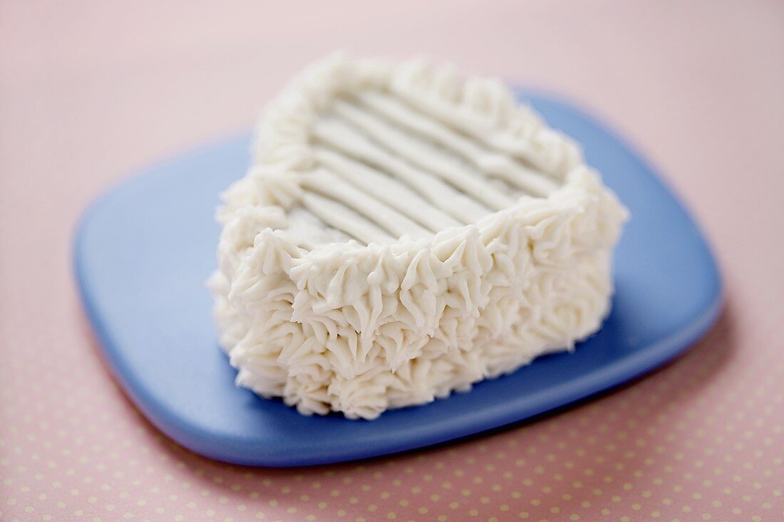 Single Vanilla Frosted Heart Shaped Cupcake