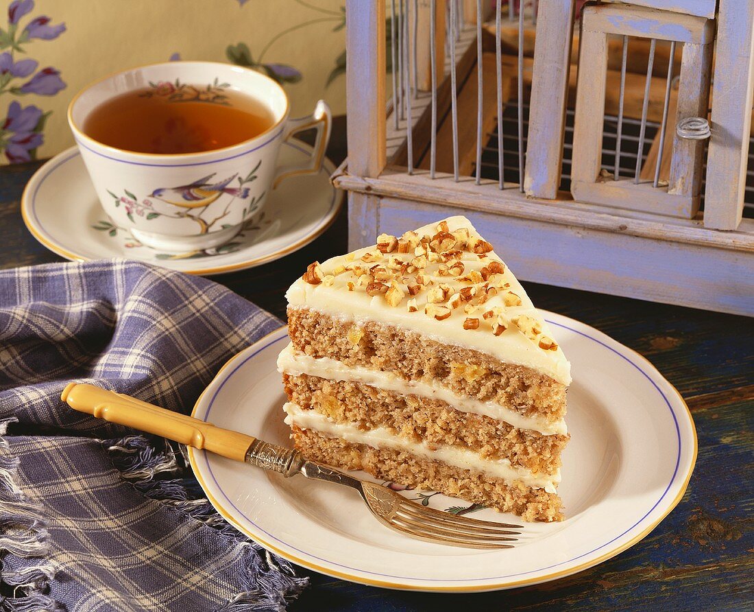 Piece of Hummingbird Cake with a Cup of Tea
