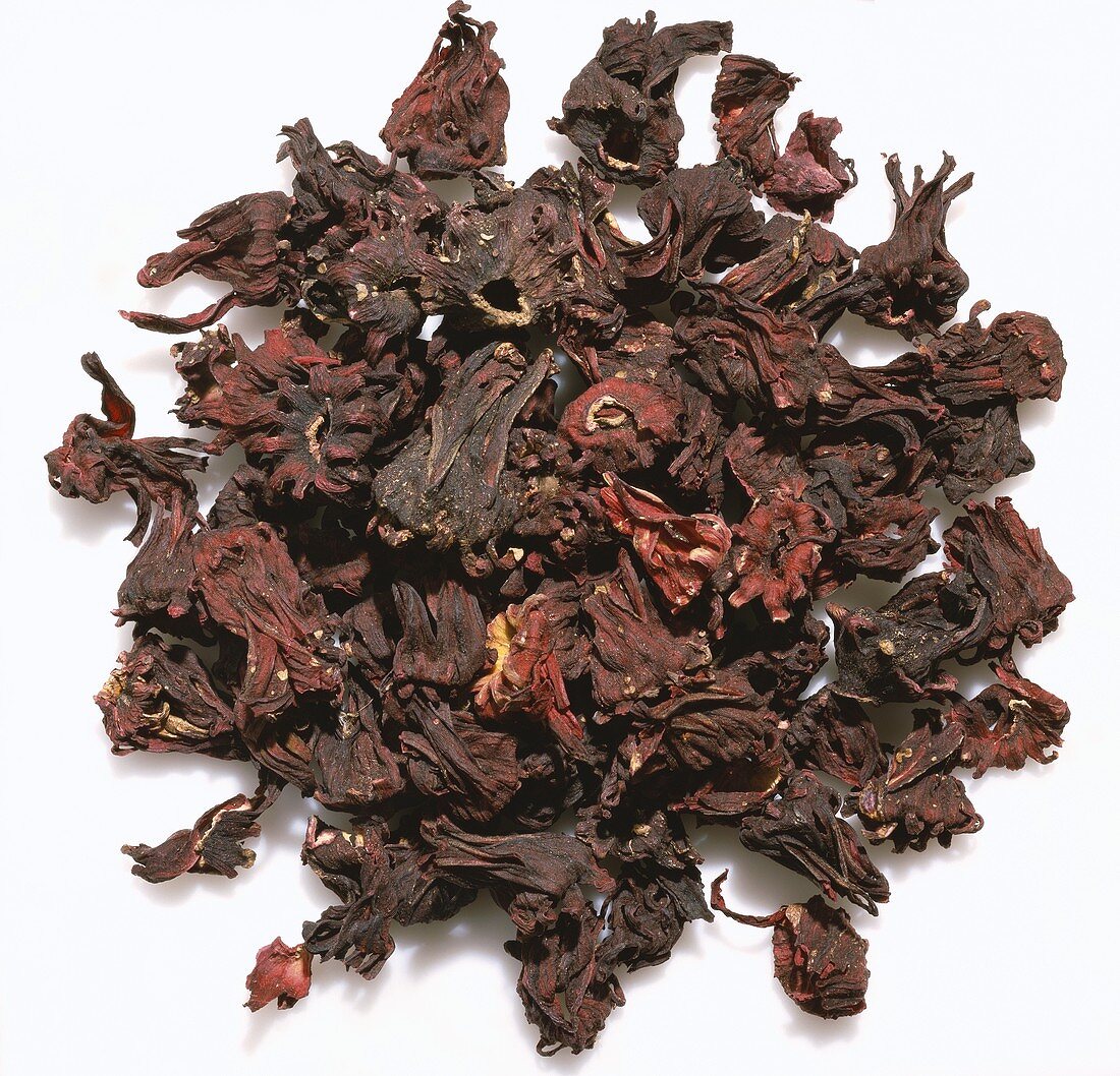Pile of Dried Hibiscus on a White Background