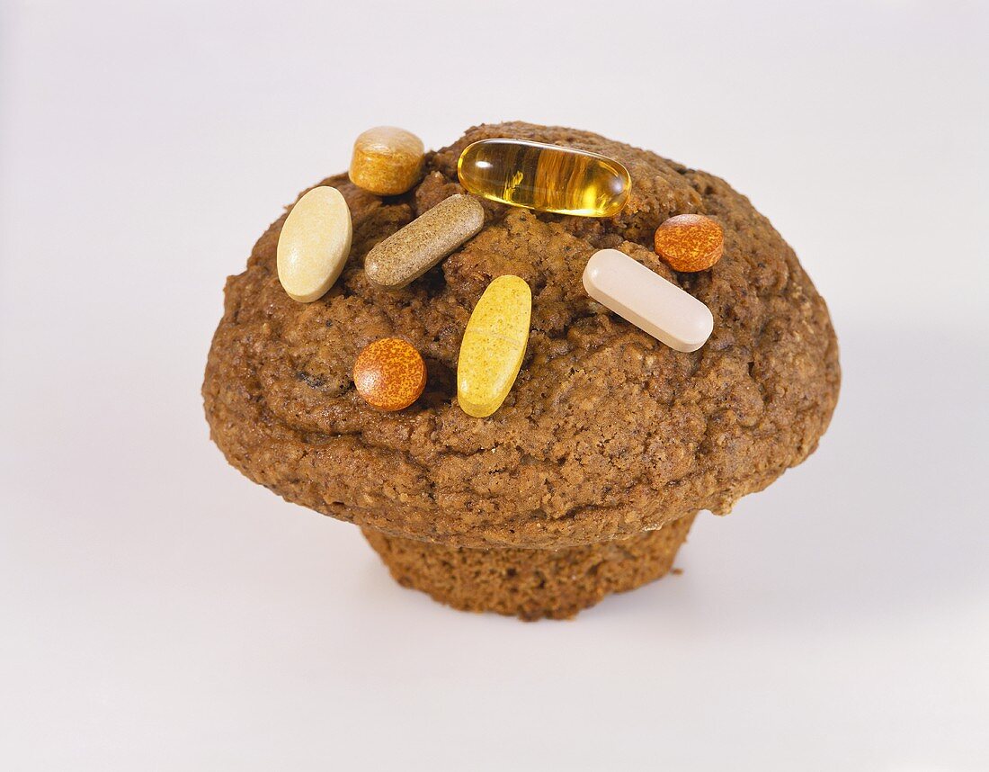 Bran Muffin Topped with Assorted Vitamins