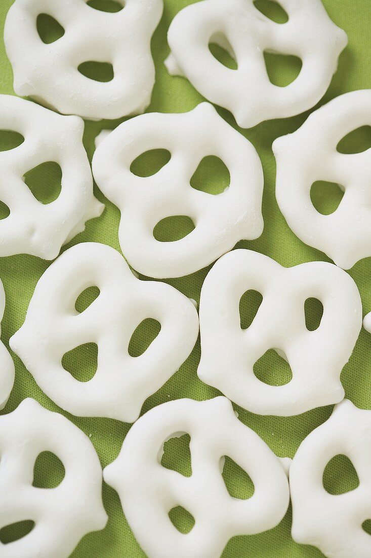 Yogurt Covered Pretzels on a Green Background